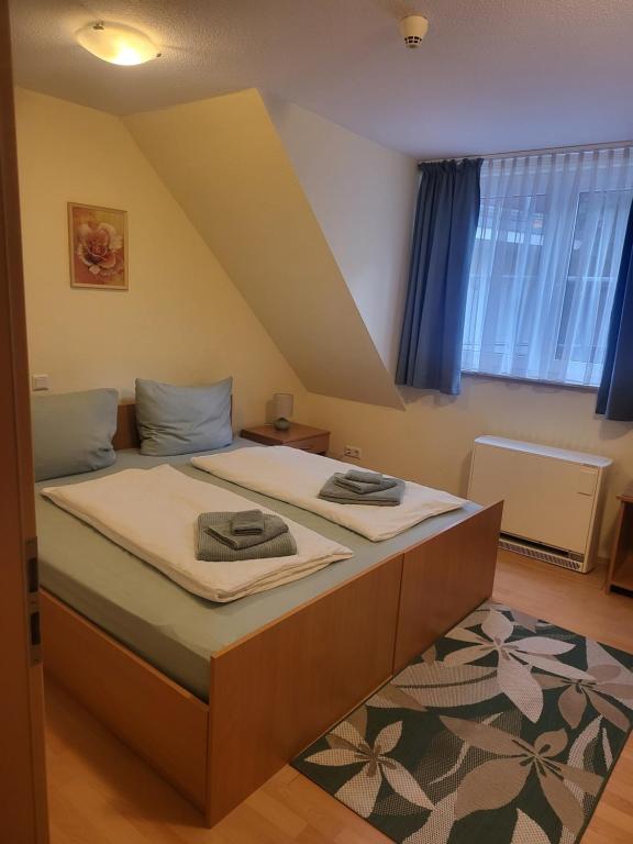 Postel nebo postele na pokoji v ubytování Ritters Weinstuben