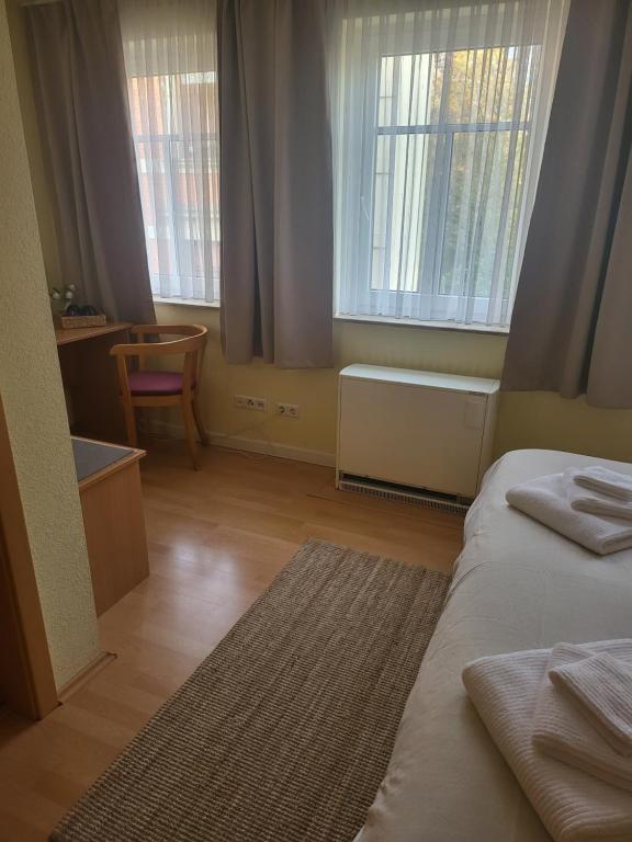 Postel nebo postele na pokoji v ubytování Ritters Weinstuben