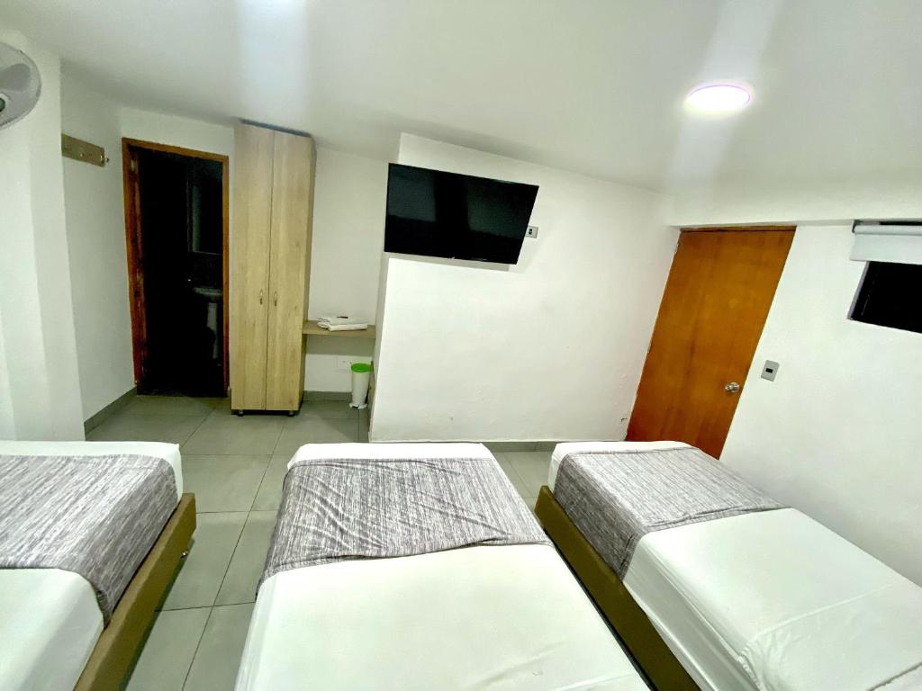 TV a/nebo společenská místnost v ubytování Hotel Boutique Street 50