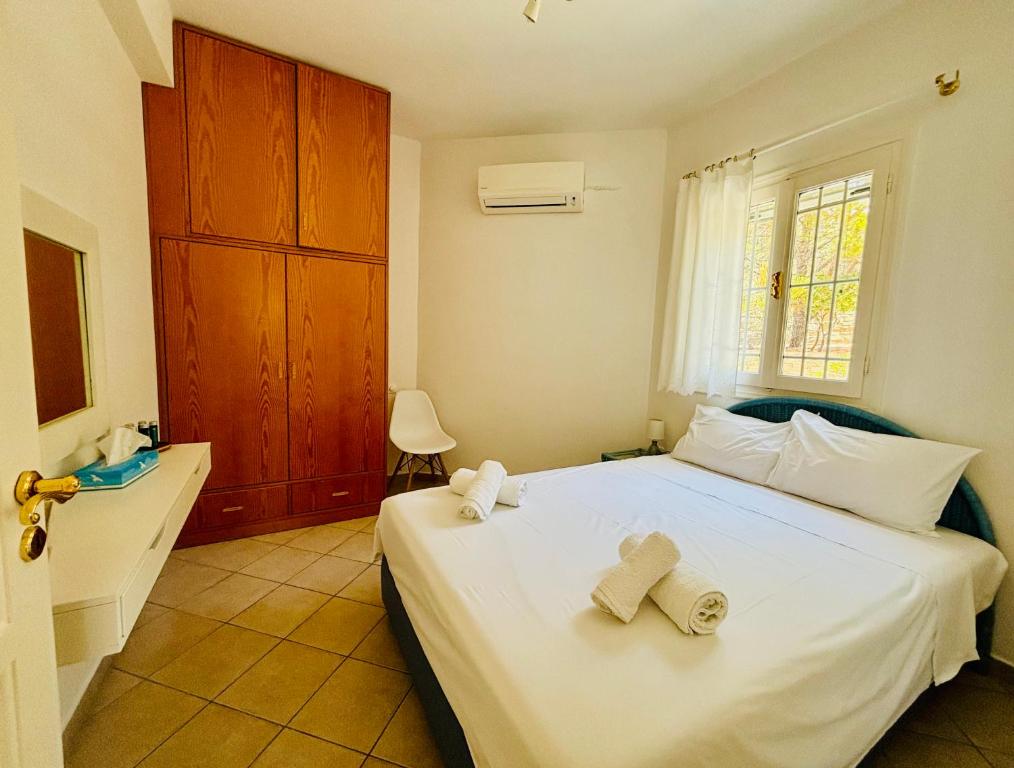Posteľ alebo postele v izbe v ubytovaní Beachfront-Santa Marina Vacation Home