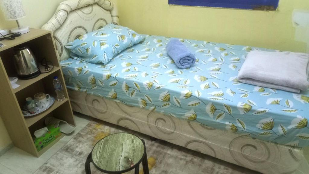 Postel nebo postele na pokoji v ubytování SALEM House Hostel Nizwa
