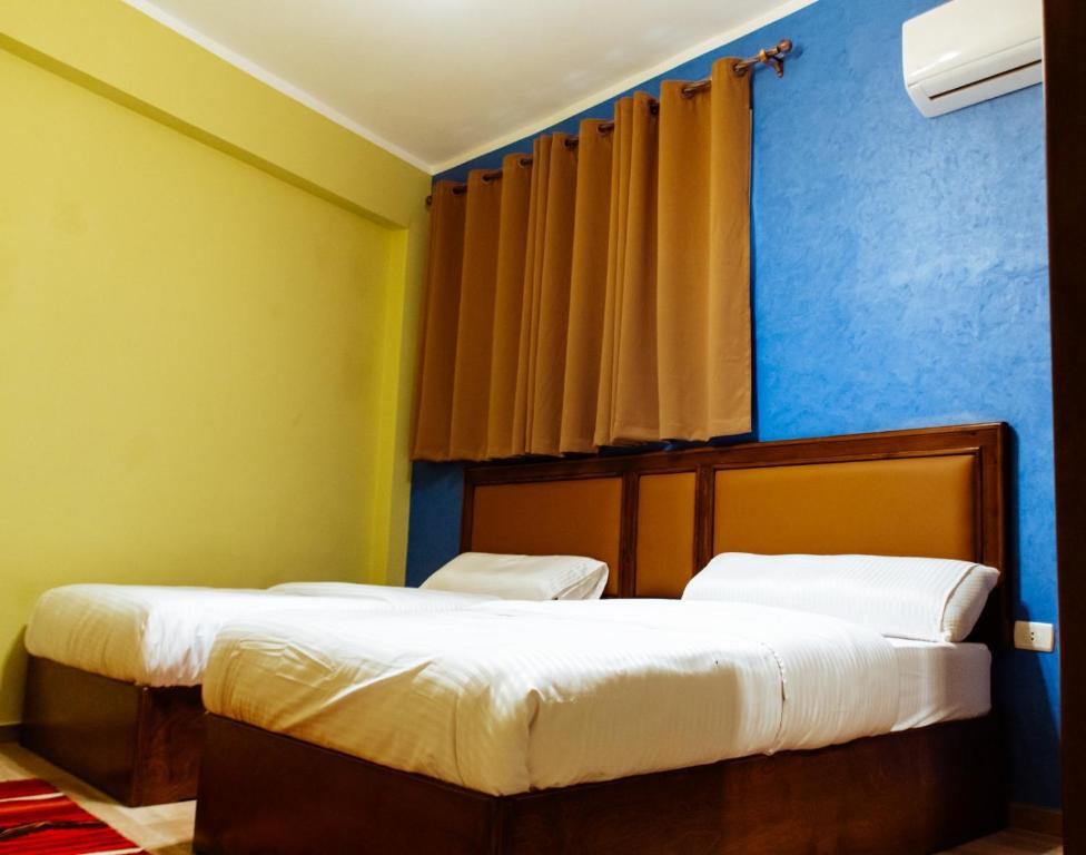 Postel nebo postele na pokoji v ubytování 2Rest
