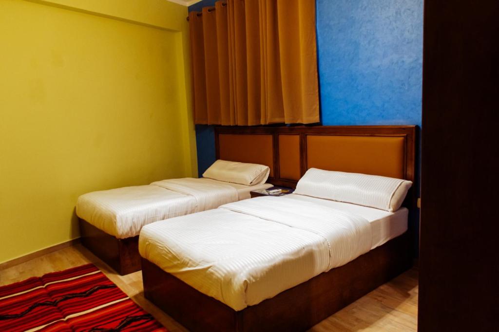 Postel nebo postele na pokoji v ubytování 2Rest
