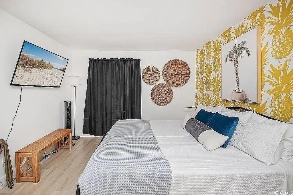 Ein Bett oder Betten in einem Zimmer der Unterkunft Coastal Comfort Your Perfect Beachfront Getaway