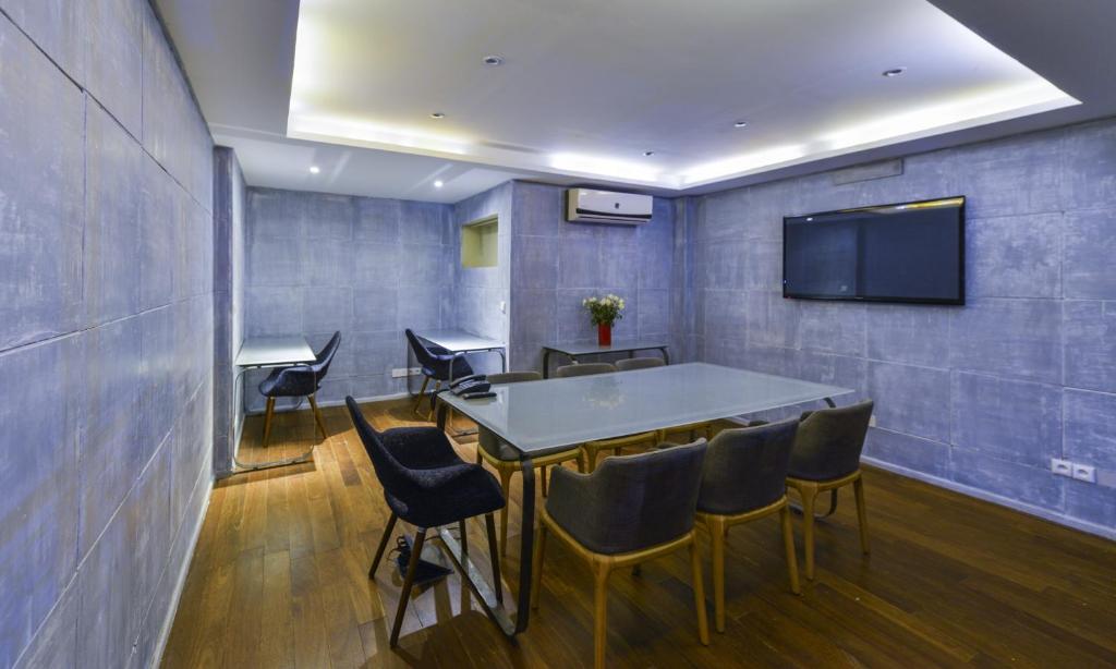 TV a/nebo společenská místnost v ubytování Hotel Islane