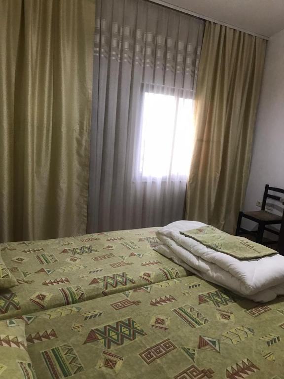 Postel nebo postele na pokoji v ubytování VILA CANO Boutique