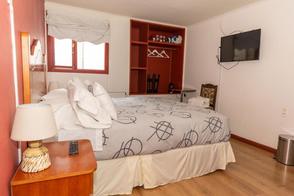 TV a/nebo společenská místnost v ubytování Hotel Milodon