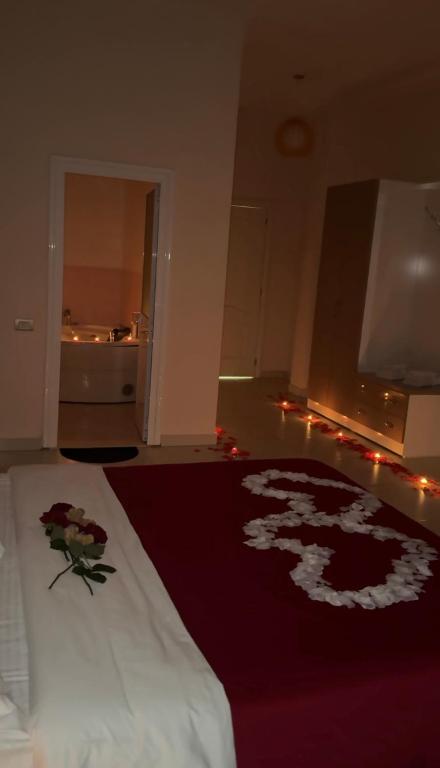 Postel nebo postele na pokoji v ubytování Grand Hotel Gjyshi