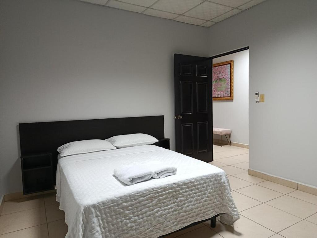 Postel nebo postele na pokoji v ubytování Apartamentos Marconela