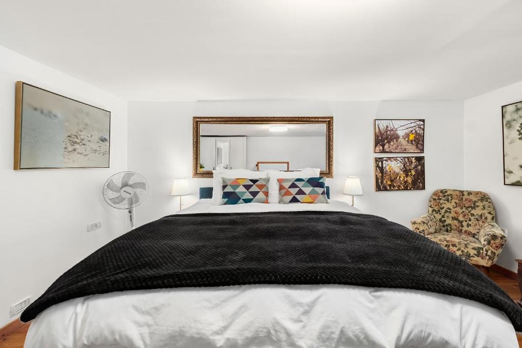 Postel nebo postele na pokoji v ubytování One Apartments TLV