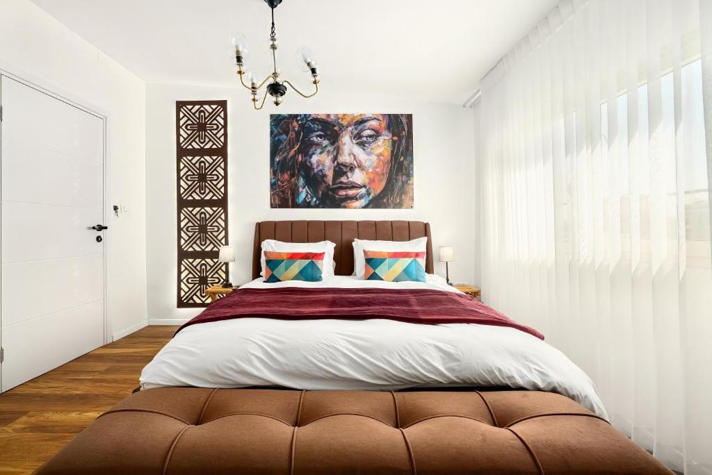 Postel nebo postele na pokoji v ubytování One Apartments TLV