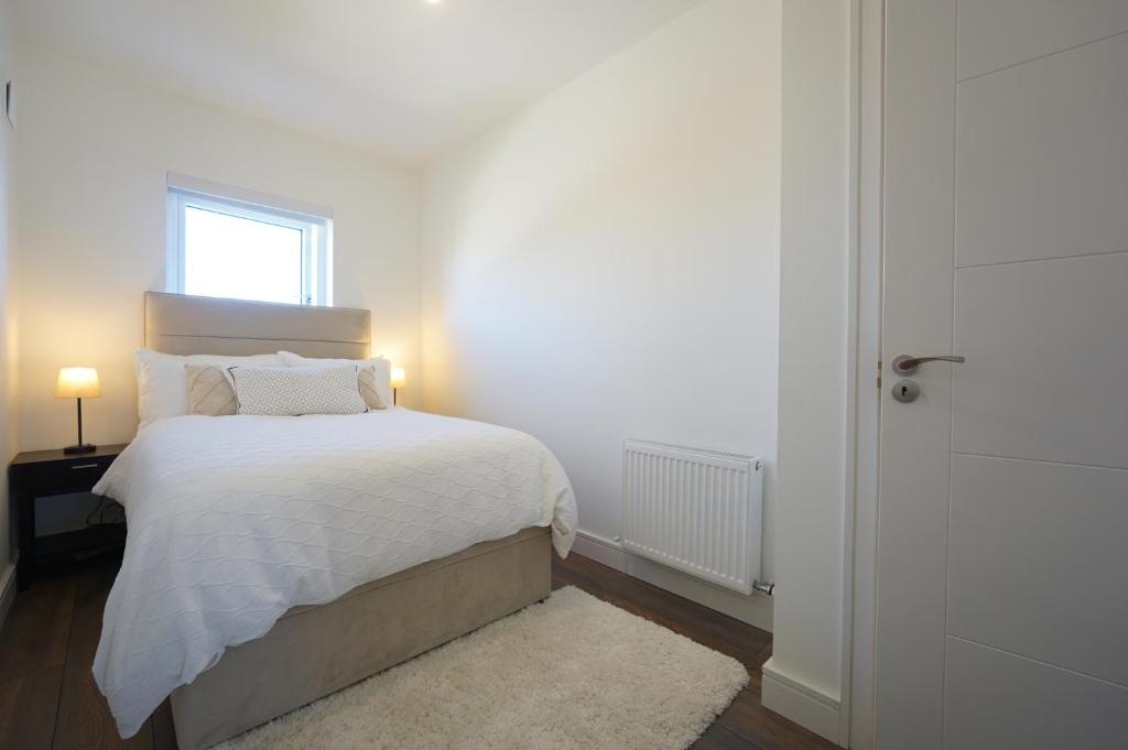 Postel nebo postele na pokoji v ubytování The Dublin Luxe