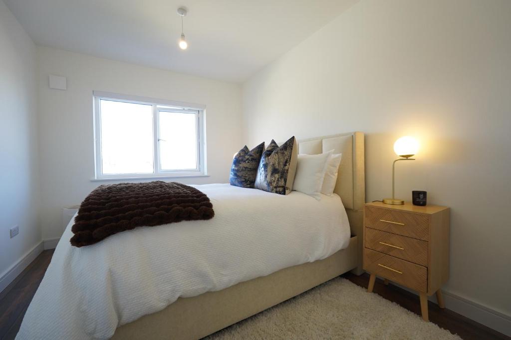 Postel nebo postele na pokoji v ubytování The Dublin Luxe