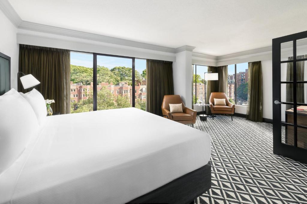 Ένα ή περισσότερα κρεβάτια σε δωμάτιο στο The Arcadian