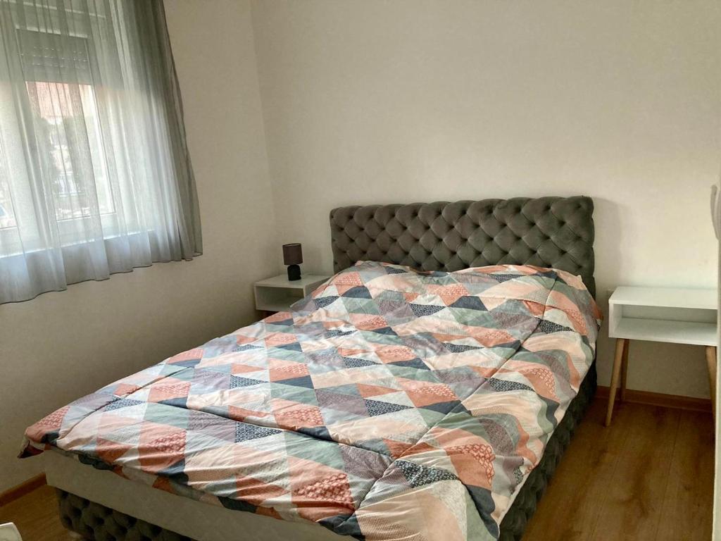 Postel nebo postele na pokoji v ubytování SANI