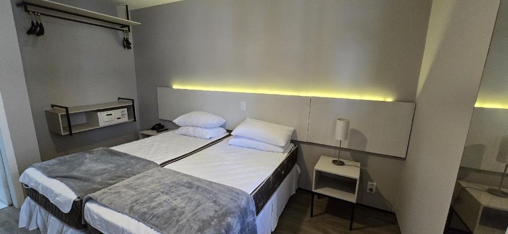 Postel nebo postele na pokoji v ubytování Golden Flat By Fortaleza Temporada