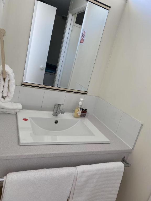 Koupelna v ubytování Malones Spa Motel