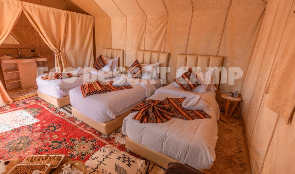Postel nebo postele na pokoji v ubytování Eco Desert Camp