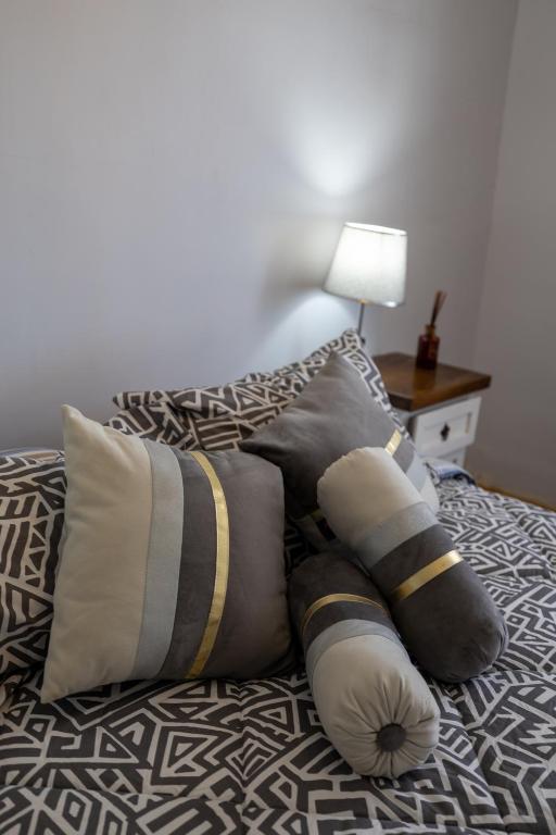 Postel nebo postele na pokoji v ubytování Hostal Ruta del Desierto