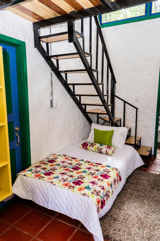 Postel nebo postele na pokoji v ubytování Hotel campestre La Esperanza en Dios