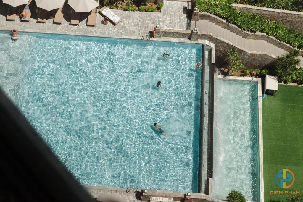 Hồ bơi trong/gần Apec Mandala Cham Bay Mui Ne - Ruby Apartment