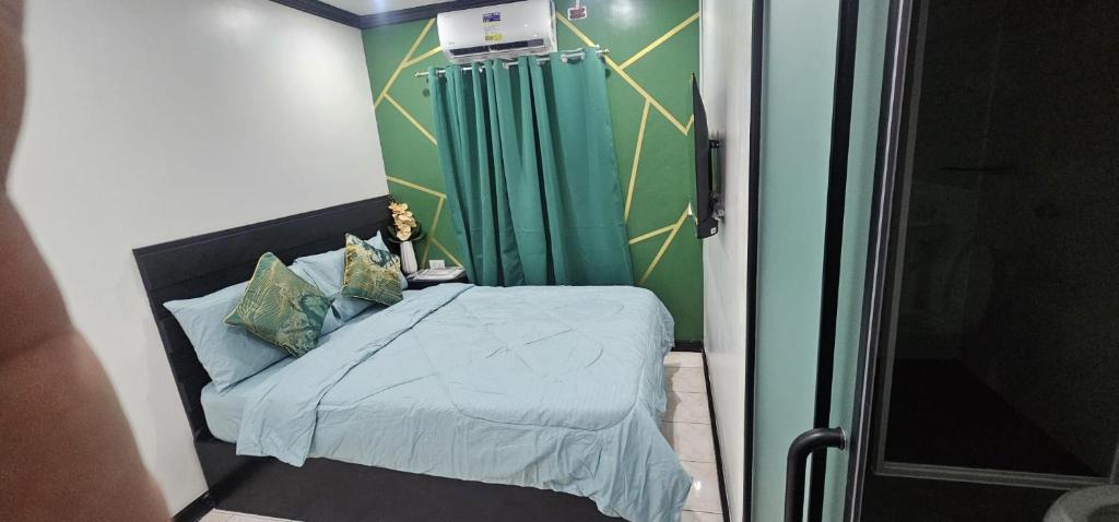 Postel nebo postele na pokoji v ubytování BZ Hostel Cebu