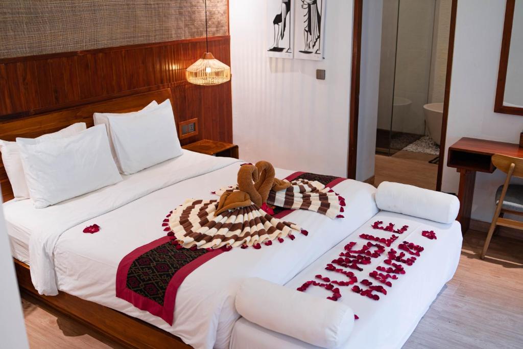 Postel nebo postele na pokoji v ubytování Jungle Haven Resort Central Ubud