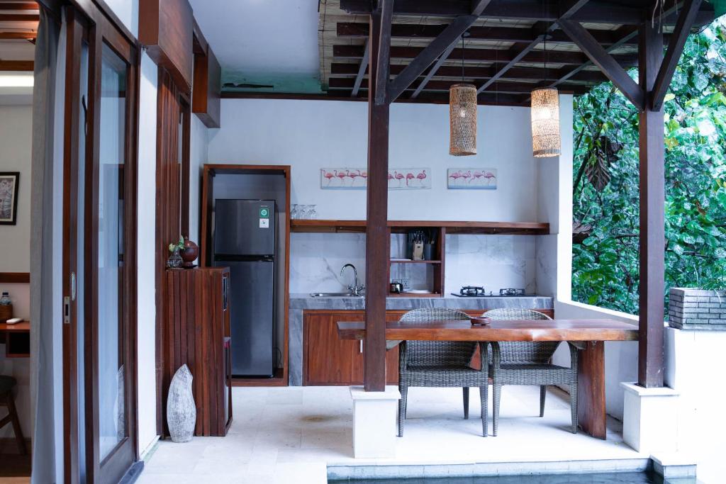 Kuchyň nebo kuchyňský kout v ubytování Jungle Haven Resort Central Ubud