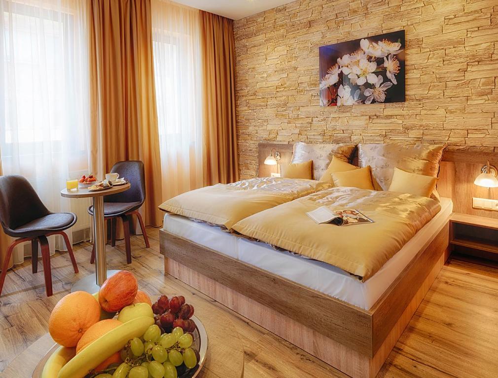 Voodi või voodid majutusasutuse Hotel Viktor toas
