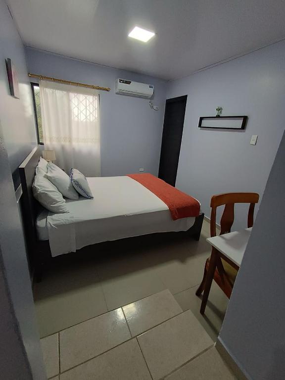 Postel nebo postele na pokoji v ubytování L'Vanna Hotel