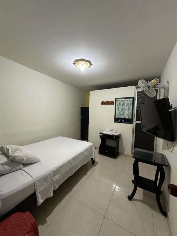 Postel nebo postele na pokoji v ubytování Las Camelias Apartahotel
