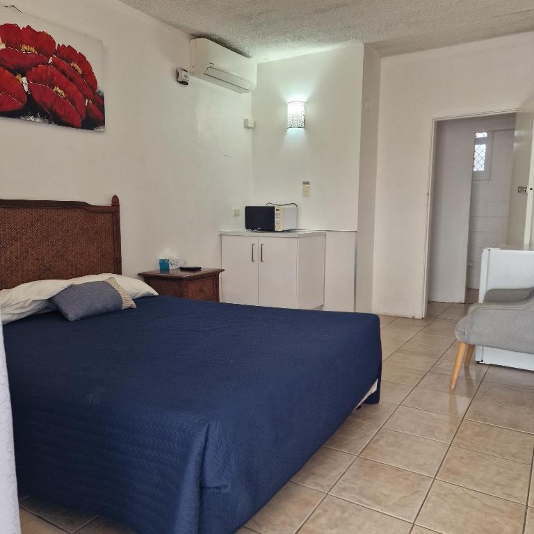 Postel nebo postele na pokoji v ubytování A1 Inn the city A1 Car Rentals