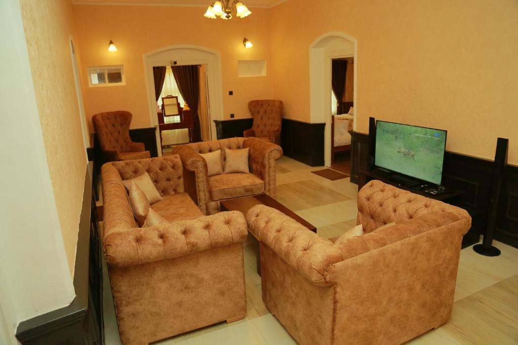 TV a/nebo společenská místnost v ubytování Gregory Lake View Bungalow