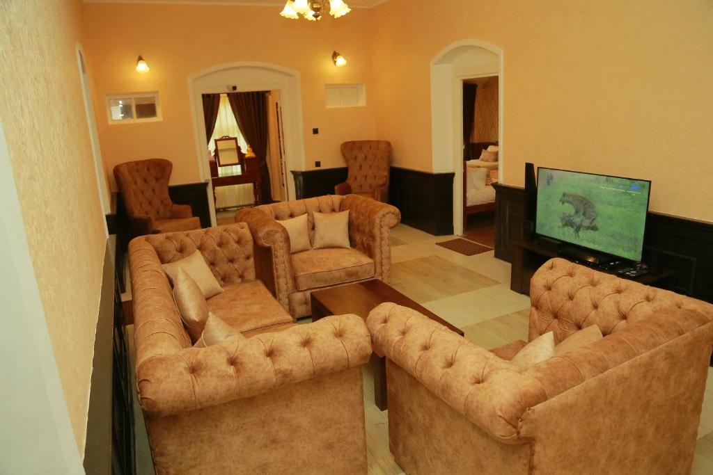 TV a/nebo společenská místnost v ubytování Gregory Lake View Bungalow