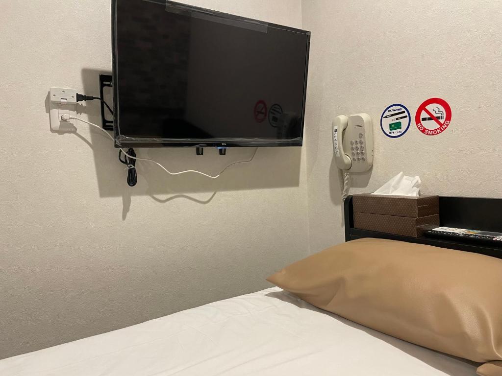 TV a/nebo společenská místnost v ubytování mr Hotel