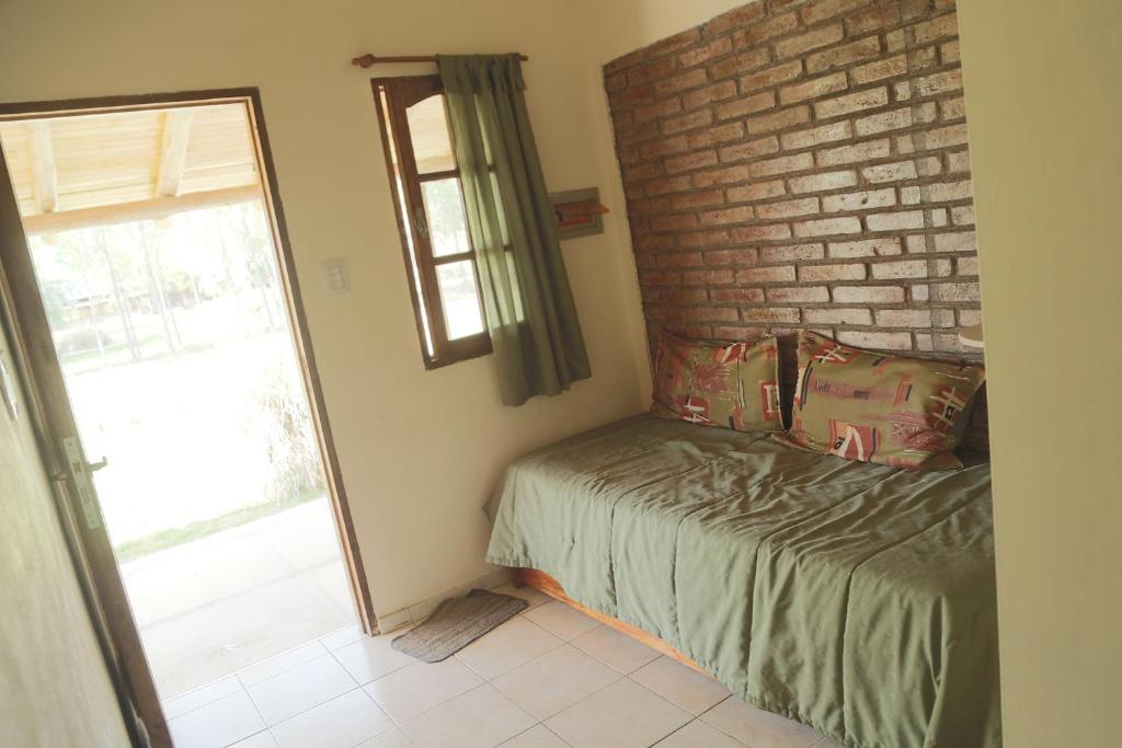 Voodi või voodid majutusasutuse Complejo Los Parrales toas