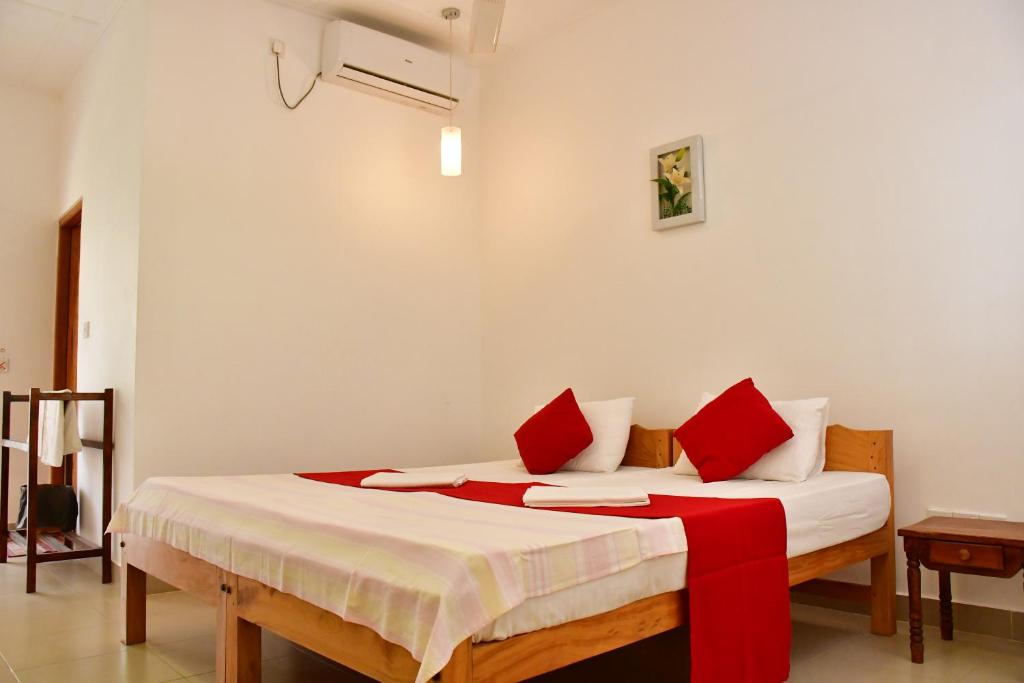 Postel nebo postele na pokoji v ubytování Sea Way Hotel