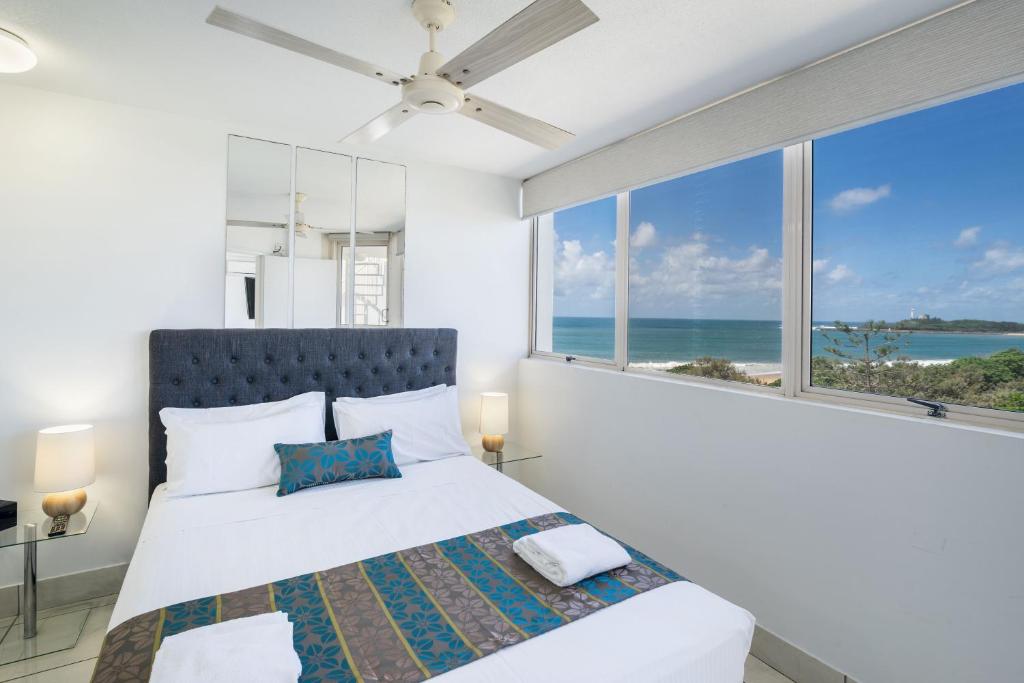 Letto o letti in una camera di Sandcastles Mooloolaba