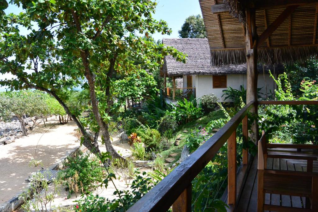 a view from the balcony of a house at Coco Komba Lodge in Nosy Komba