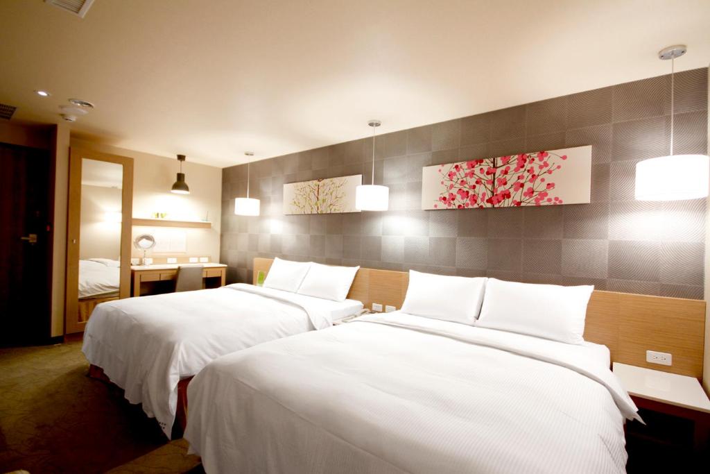 Lova arba lovos apgyvendinimo įstaigoje Kindness Hotel-Jue Ming