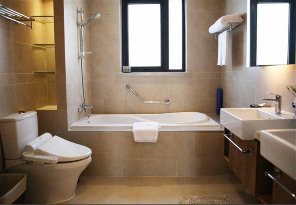 Ein Badezimmer in der Unterkunft Green Court Place Jingqiao Middle Ring Shanghai