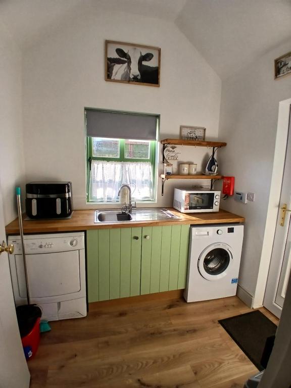 Kuchyň nebo kuchyňský kout v ubytování St Kevins Cottage
