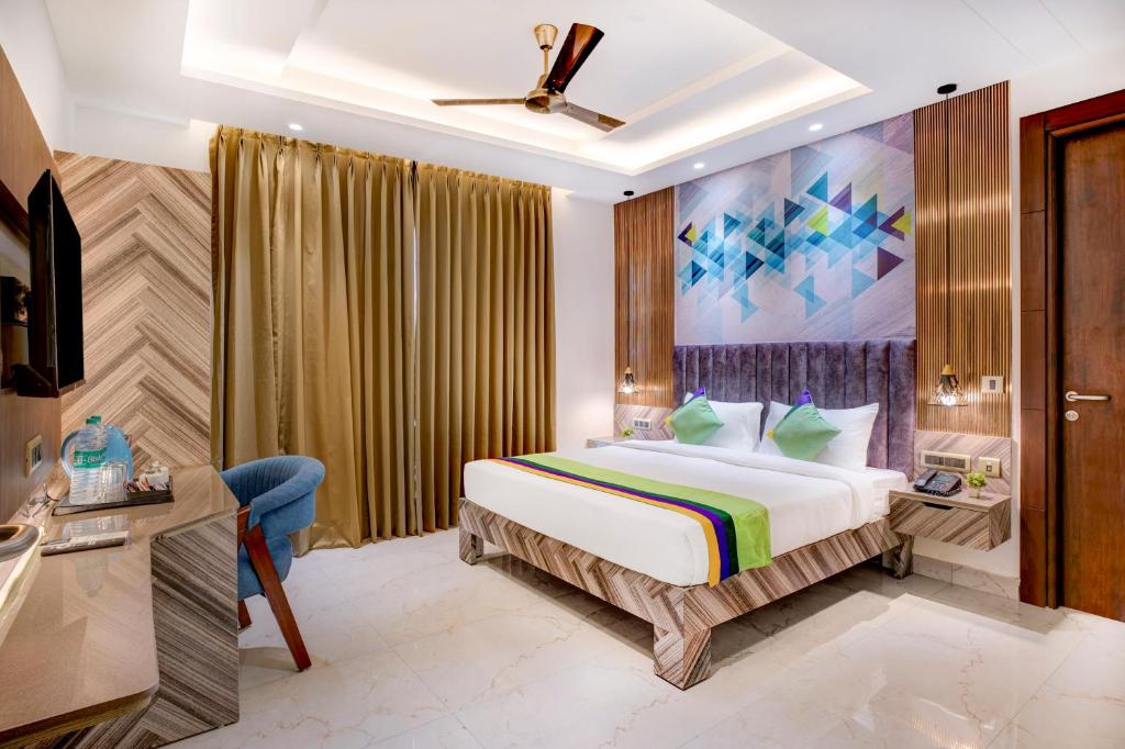 Ένα ή περισσότερα κρεβάτια σε δωμάτιο στο Treebo Corporate Inn