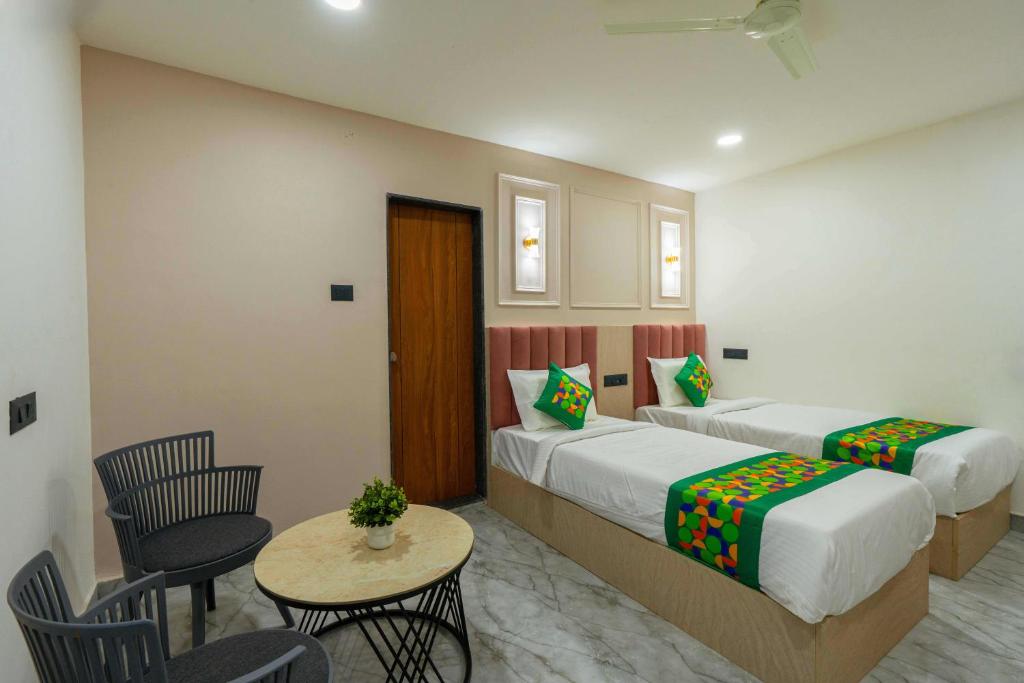 Voodi või voodid majutusasutuse Treebo The Tree, Hinjewadi toas