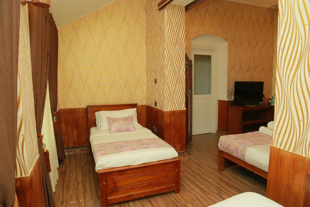 Postel nebo postele na pokoji v ubytování Gregory Lake View Bungalow