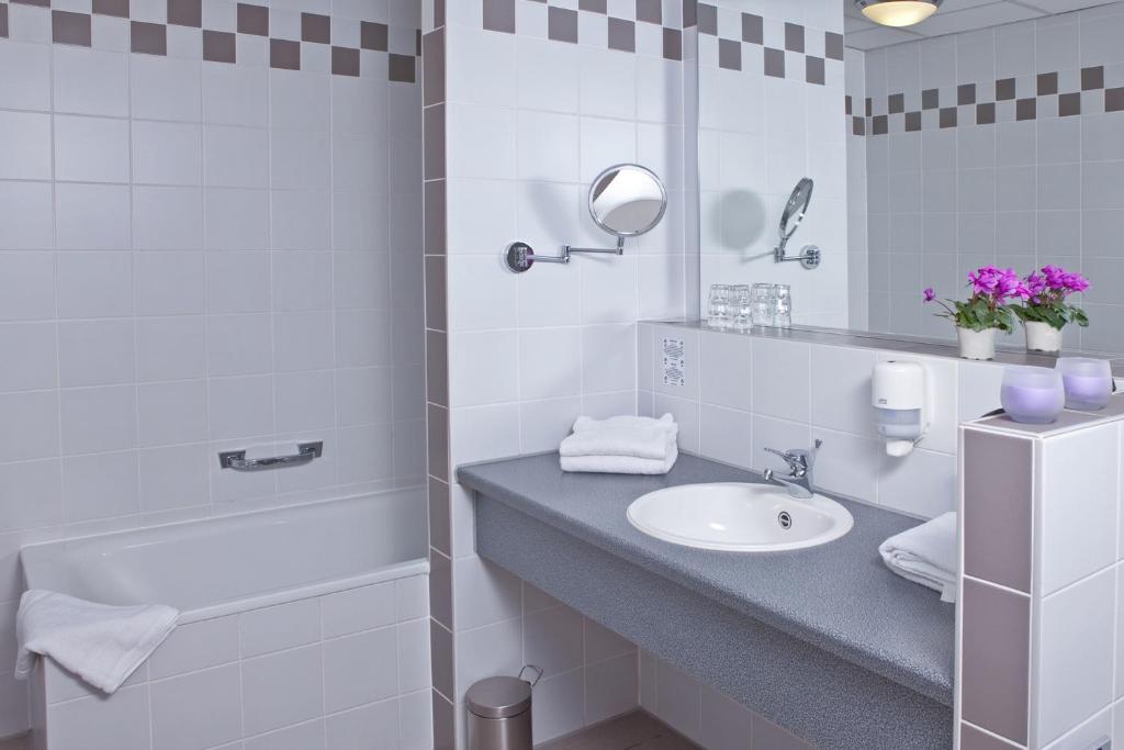 Koupelna v ubytování Hotel Strohofer