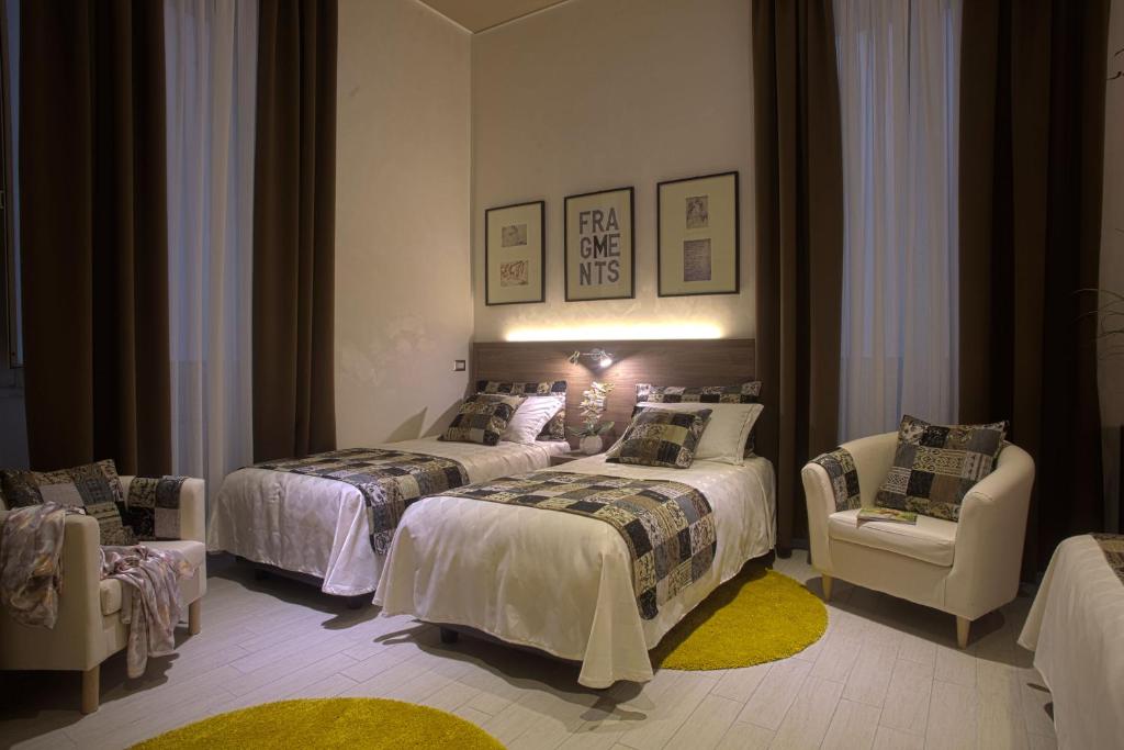 Postel nebo postele na pokoji v ubytování Hotel Marcantonio