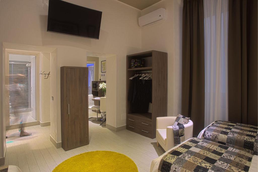Postel nebo postele na pokoji v ubytování Hotel Marcantonio