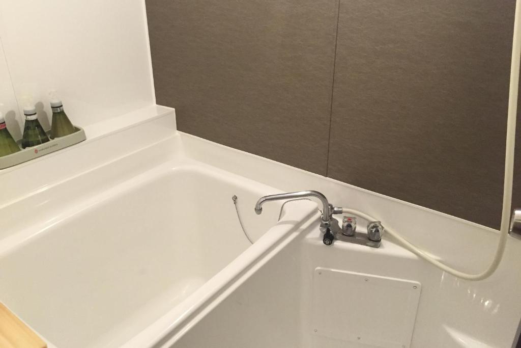 Ein Badezimmer in der Unterkunft Umibenokakureyu Seiryu