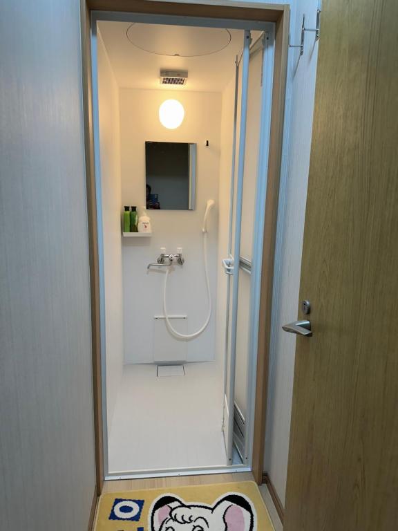 TV a/nebo společenská místnost v ubytování Guest house En